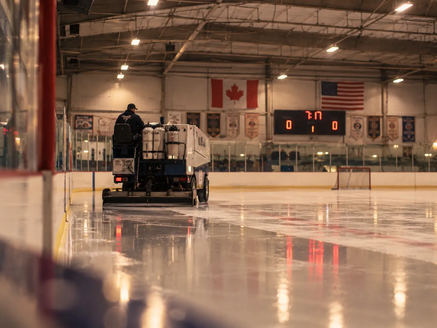 Zamboni resurfacing the ice at a hockey rink